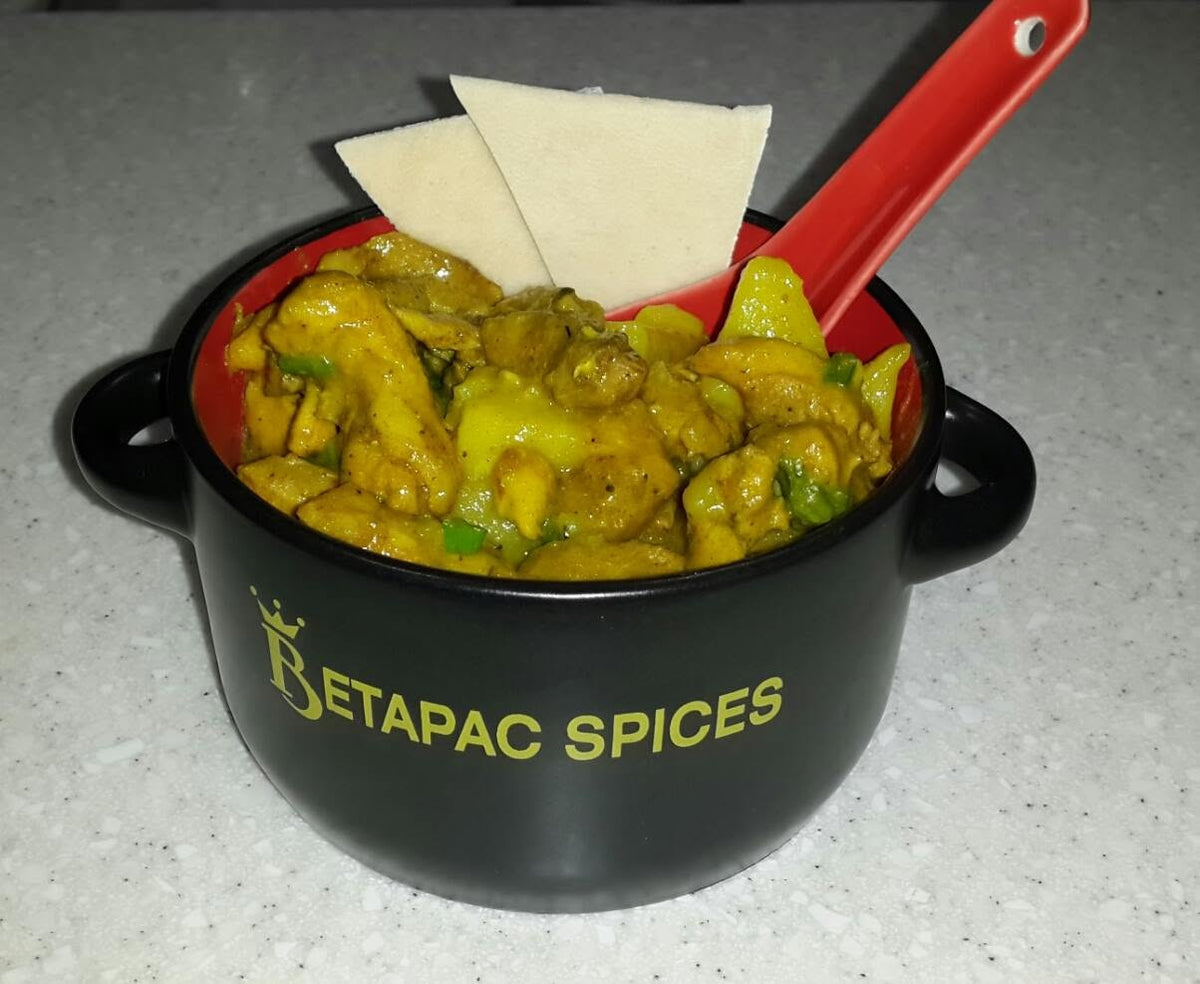 Jamaican curry chicken and potatoes prepared with Betapac Curry Powder
