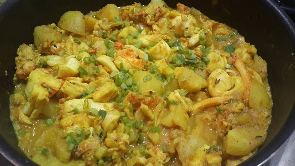 Jamaican curry dish with chicken and potatoes prepared with Betapac Curry Powder