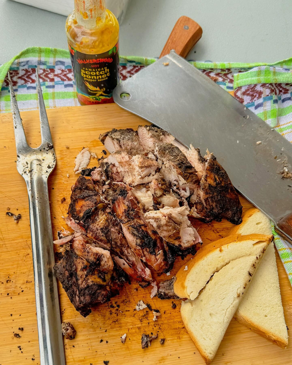 Walkerswood Scotch Bonnet Pepper Sauce served with Jamaican food